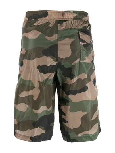 Shop Moncler Camouflage Print Swim Shorts In Green