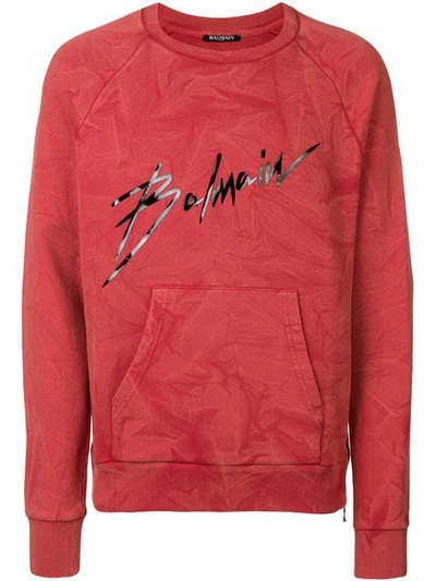 Shop Balmain Signature Print Sweatshirt In Red