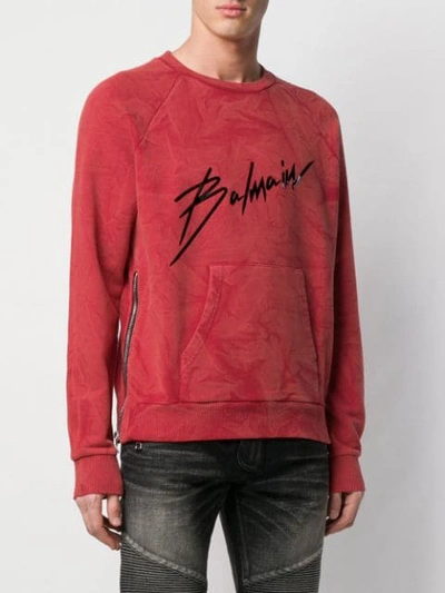 Shop Balmain Signature Print Sweatshirt In Red