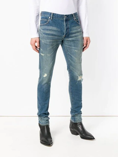 Shop Balmain Distressed Skinny Jeans In Blue