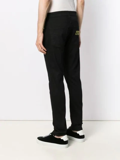 Shop Versace Jeans Couture Embroidered Logo Slim-fit Jeans In Black
