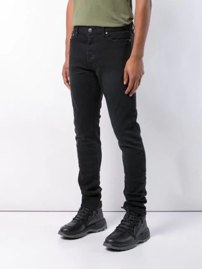 Shop John Elliott Long Skinny Jeans In Black