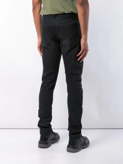 Shop John Elliott Long Skinny Jeans In Black