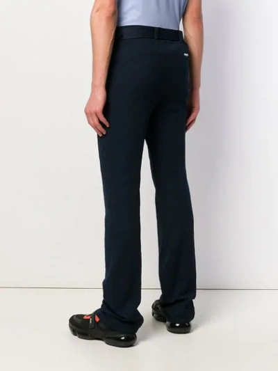 Shop Prada Technical Jacquard Trousers In Blue