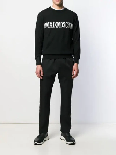Shop Moschino Logo Knitted Jumper In Black