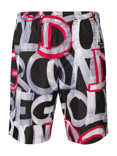 Shop Dolce & Gabbana Logo Print Swimming Trunks In Black