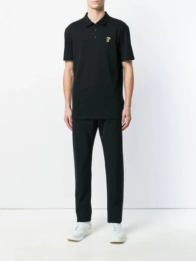 Shop Versace Half Medusa Patch Polo Shirt In Black