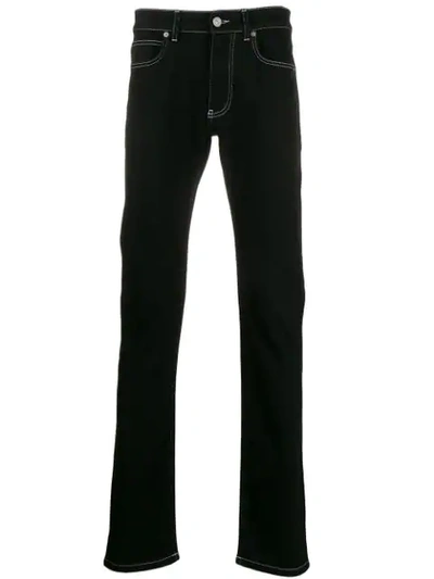 Shop Versace Contrast Stitch Straight Jeans In Black