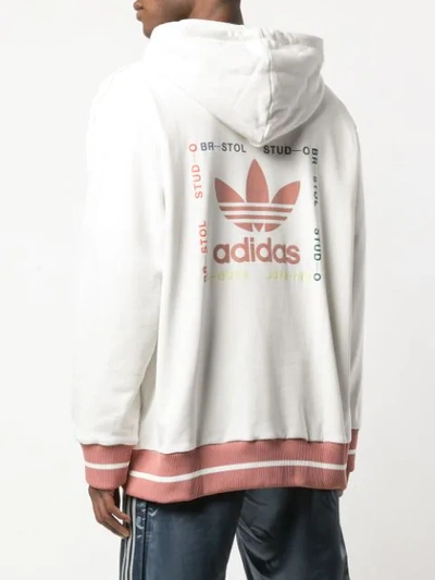 Shop Adidas Originals Striped Hem Hoodie In White