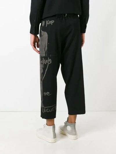Shop Yohji Yamamoto Printed Pants - Black