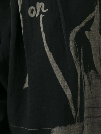 Shop Yohji Yamamoto Printed Pants - Black