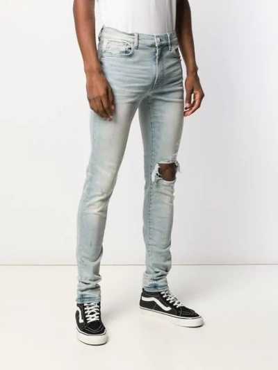 Shop Amiri Bootcut Skinny Jeans In Blue