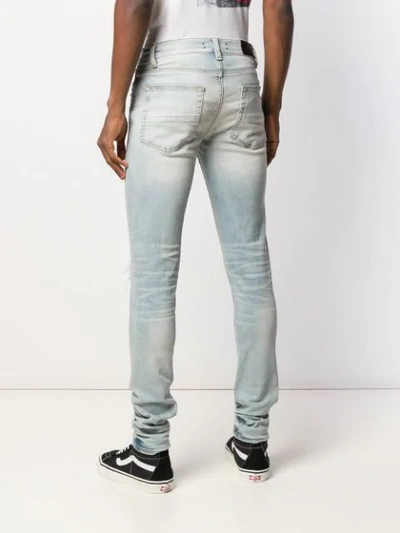 Shop Amiri Bootcut Skinny Jeans In Blue