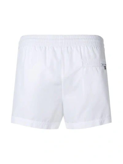 Shop Dolce & Gabbana Stripe Detail Swim Shorts In White