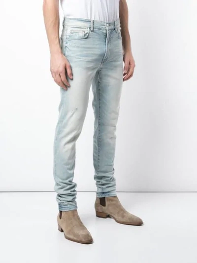 Shop Amiri Low Rise Skinny Jeans In Blue