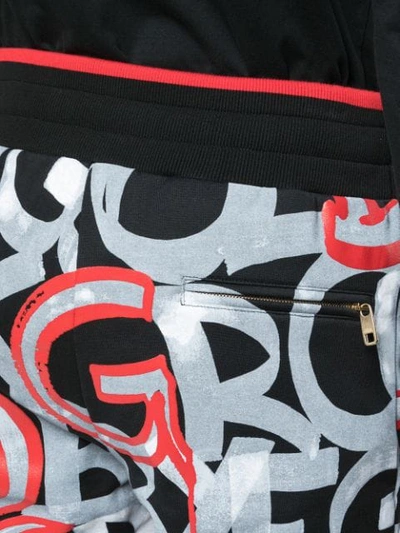 Shop Dolce & Gabbana Logo Print Track Pants In Black