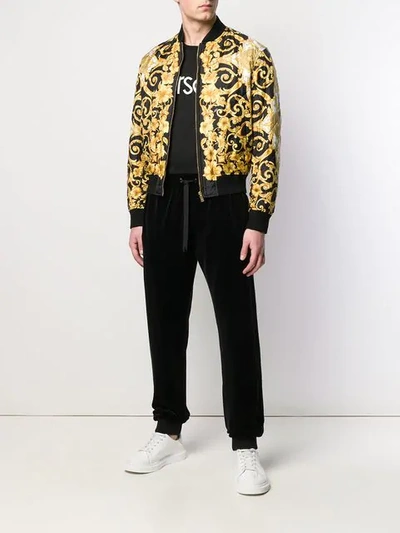 Shop Versace Baroque Print Bomber Jacket In Yellow