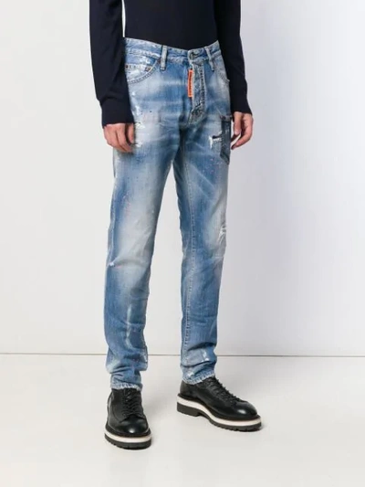 Shop Dsquared2 Distressed Rave On Jeans In Blue