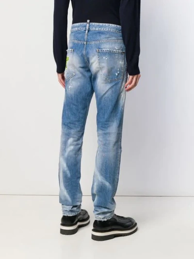 Shop Dsquared2 Distressed Rave On Jeans In Blue