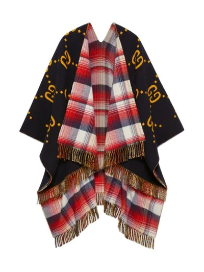 Shop Gucci Reversible Gg Wool Poncho In Red ,white
