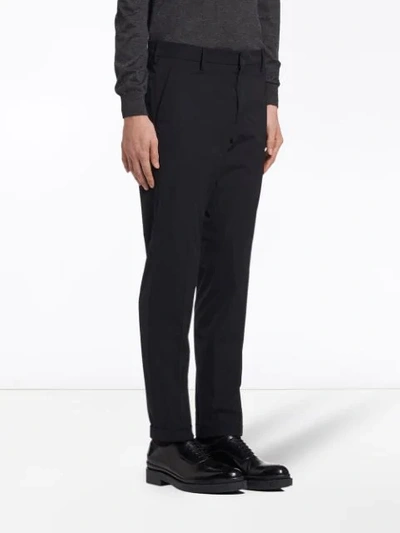 Shop Prada Light Stretch Techno Fabric Trousers In Black