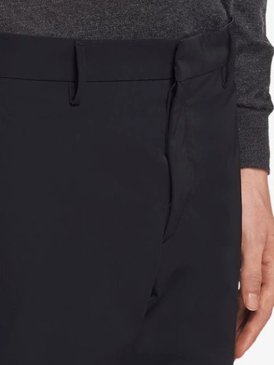 Shop Prada Light Stretch Techno Fabric Trousers In Black