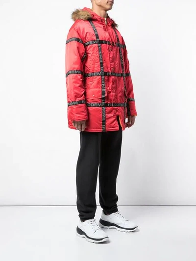 Shop Supreme Logo Tape Parka Coat In Red