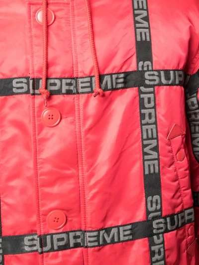 Shop Supreme Logo Tape Parka Coat In Red