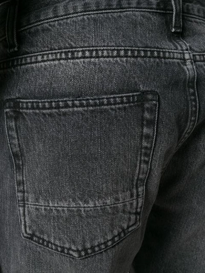 Shop Alexander Mcqueen Distressed Straight Cut Jeans In Black