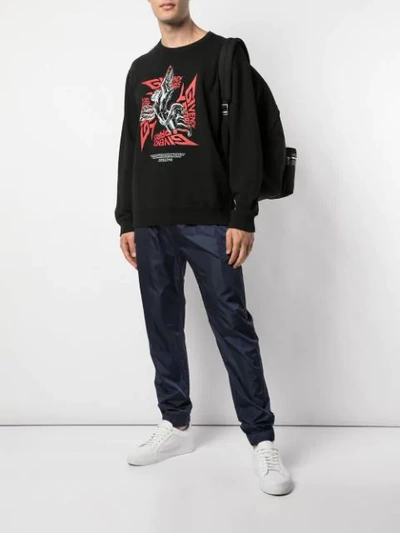Shop Givenchy Graphic Print Sweatshirt In 001 Black