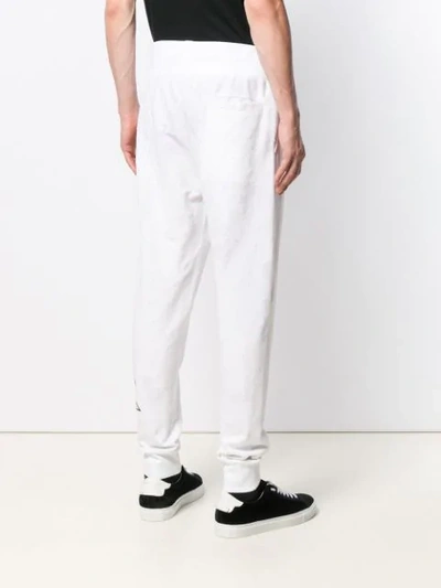 Shop Philipp Plein Side Logo Track Pants In White