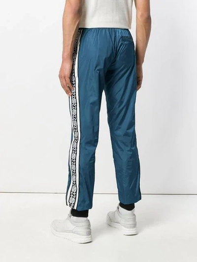 Shop Andrea Crews Side Stripe Track Pants In Blue