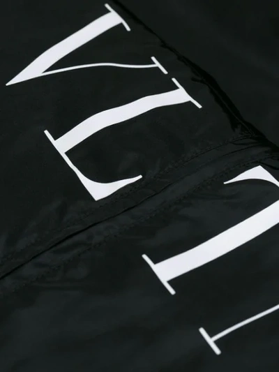 Shop Valentino Hooded Logo Jacket In Black
