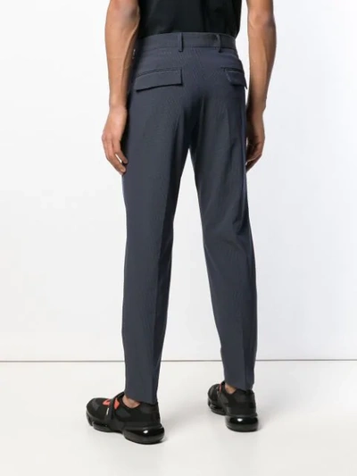 Shop Prada Micro-patterned Trousers In Blue