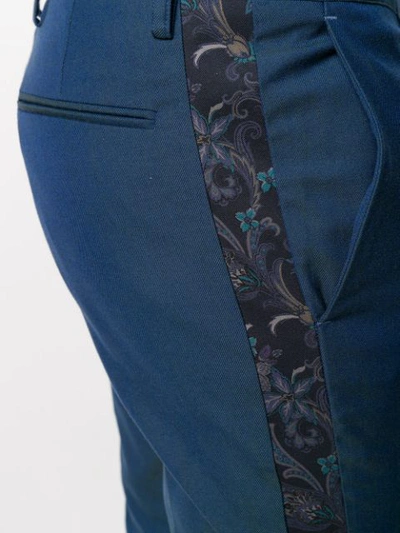 Shop Etro Floral Print Trousers In Blue