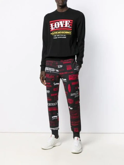 Shop Love Moschino Logo Print Jumper In C74 Black