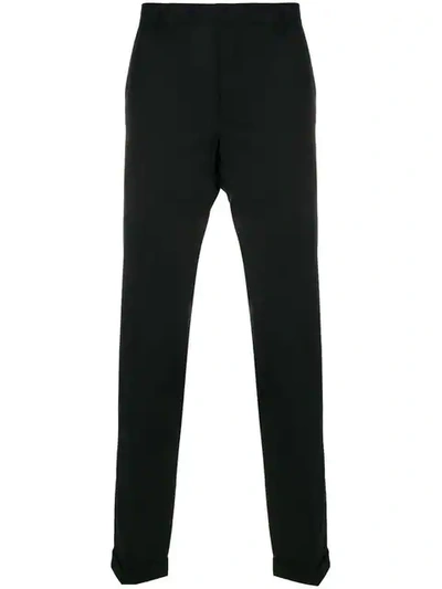 Shop Prada Pleated Tapered Trousers In Black