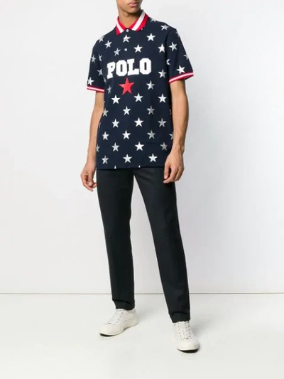 Shop Polo Ralph Lauren Star Print Polo Shirt In Blue