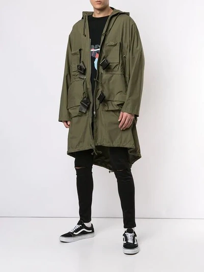 Shop Undercover Hooded Raincoat - Green