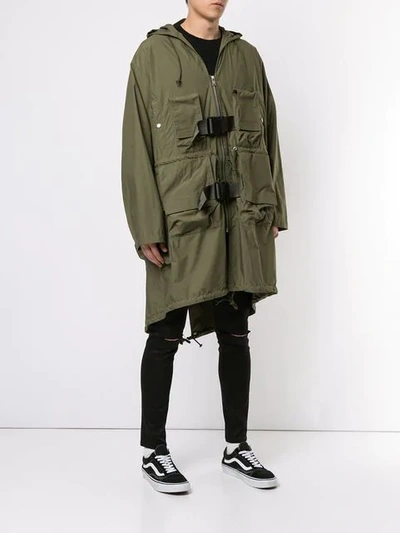 Shop Undercover Hooded Raincoat - Green