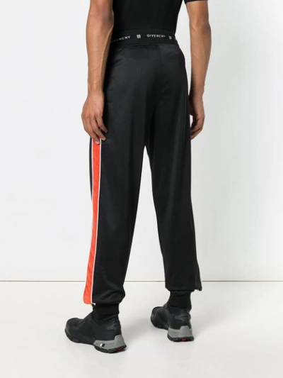 Shop Givenchy Elasticated Waist Trousers In Black