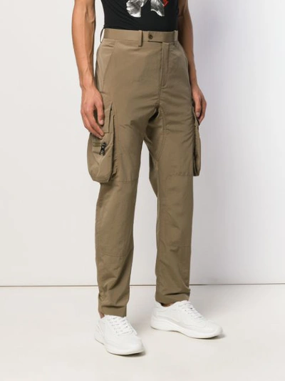Shop Neil Barrett Cargo Pocket Trousers In Brown