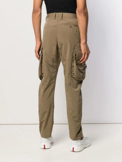 Shop Neil Barrett Cargo Pocket Trousers In Brown
