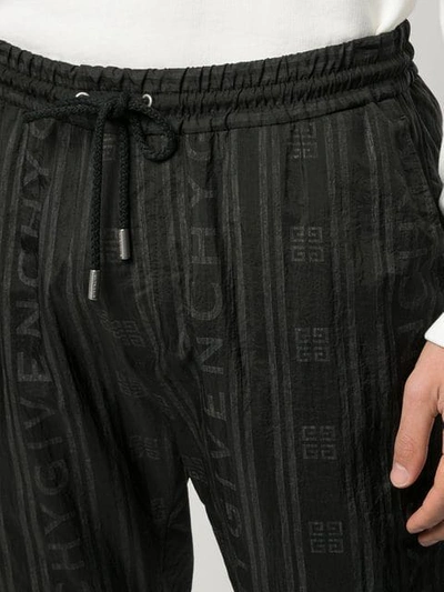 Shop Givenchy Logo Track Pants In Black