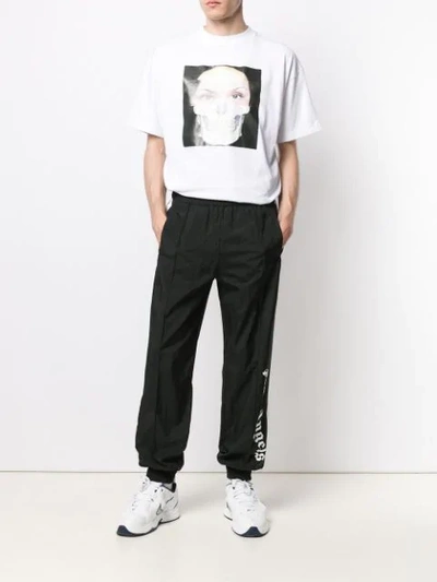 Shop Palm Angels Logo Track Trousers In Black