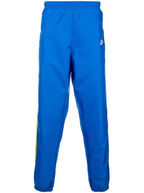 nike windrunner pants blue