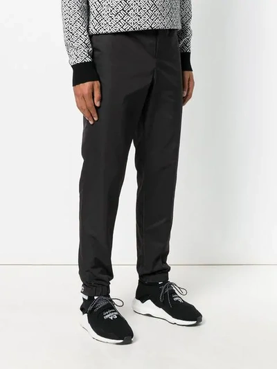 Shop Versus Logo Stripe Trousers In Black