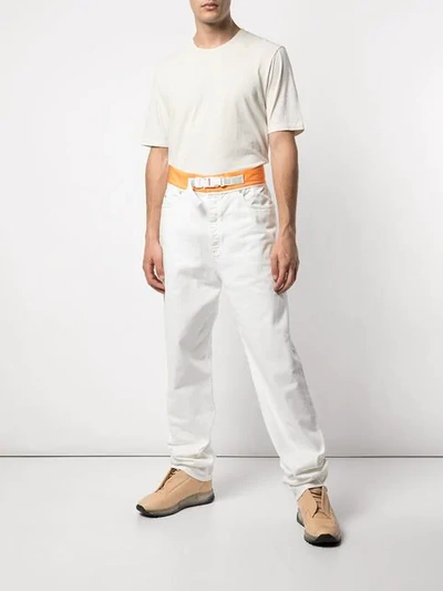 Shop Maison Margiela Loose Fit Belted Jeans In White