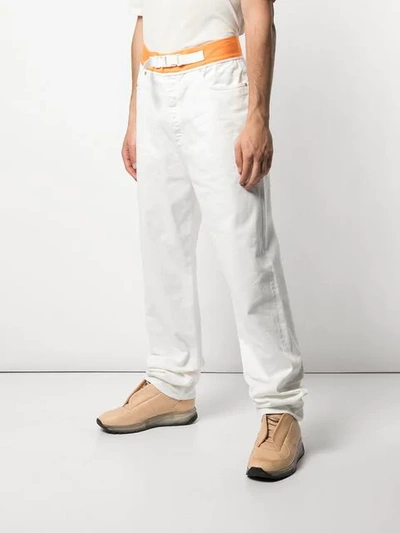 Shop Maison Margiela Loose Fit Belted Jeans In White