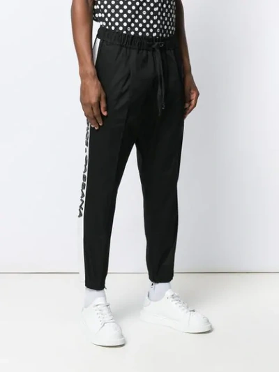 Shop Dolce & Gabbana Logo Stripe Track Trousers In Black